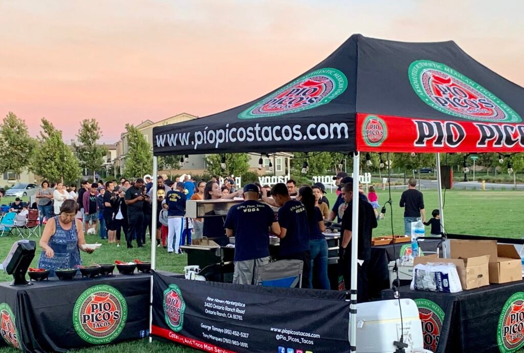 Pio Pico's Tacos team catering an outdoor community event